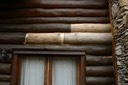 This is after the log was replaced. The owner had a small section of logs which were used to replace these and opted not to have the log end stick out again so it was covered to prevent further damage in the future.